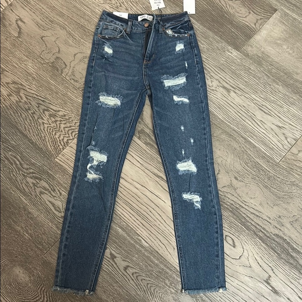 Tinsel ripped mom jeans.